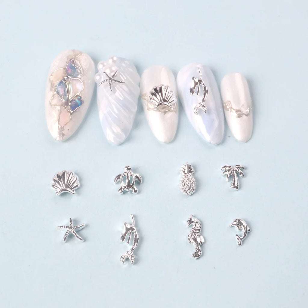 TSZS 50pcs/bag Ocean Starfish Shell Nail Art Charms Silver Beach Starfish Sea Seashell Nail Decoration Metal 3D Charms for Nail