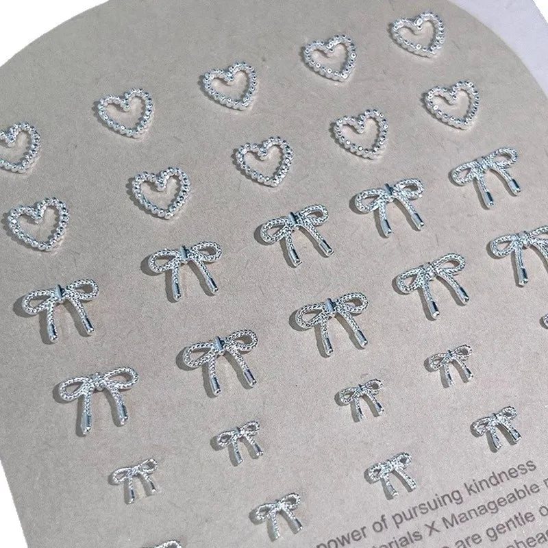 30Pcs Alloy Bowknot Love Nails Charms Decorations 3D Luxury Metal Silver Bows Jewelry Nail Art Parts DIY Manicure Designs Supply